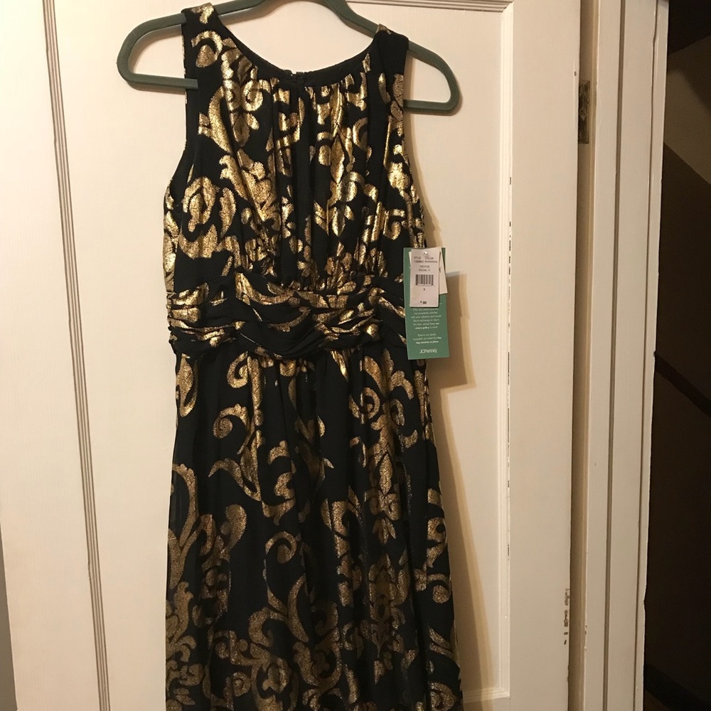 Really nice black and gold party dress!